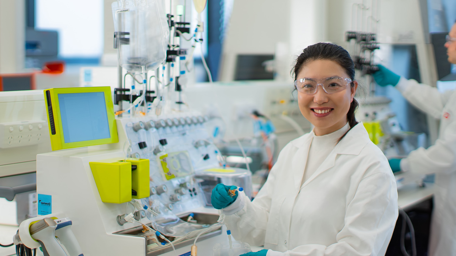 Picture of a scientist at a work station